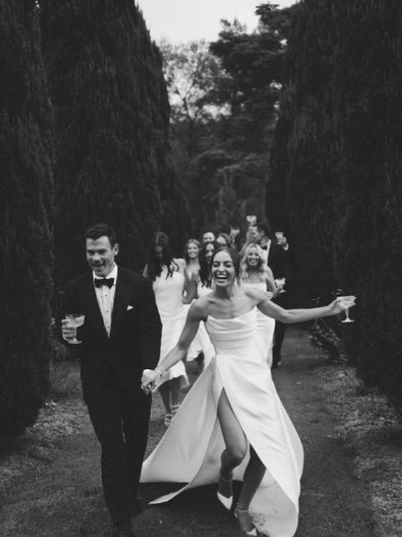 Newlyweds celebrating after the ceremony
